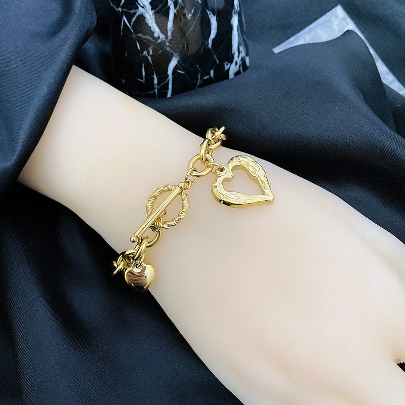 Titanium Steel Niche Light Luxury Angel Wings Love OT Buckle Bracelet Women's High-end Sense Of Cold Style Temperament Celebrity Hand Jewelry Trendy